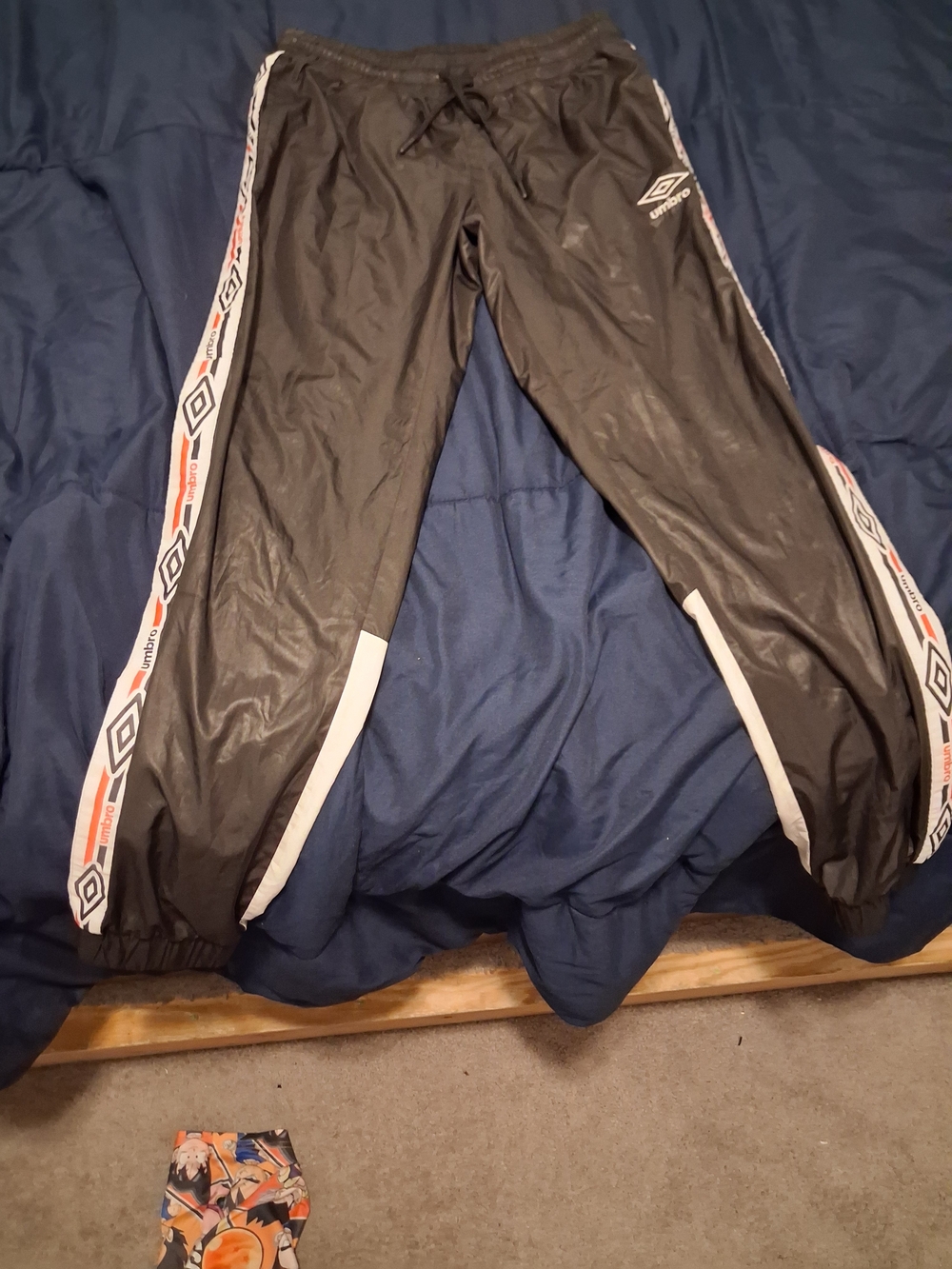 Umbro Black Kids Joggers with White and Orange Side Detailing